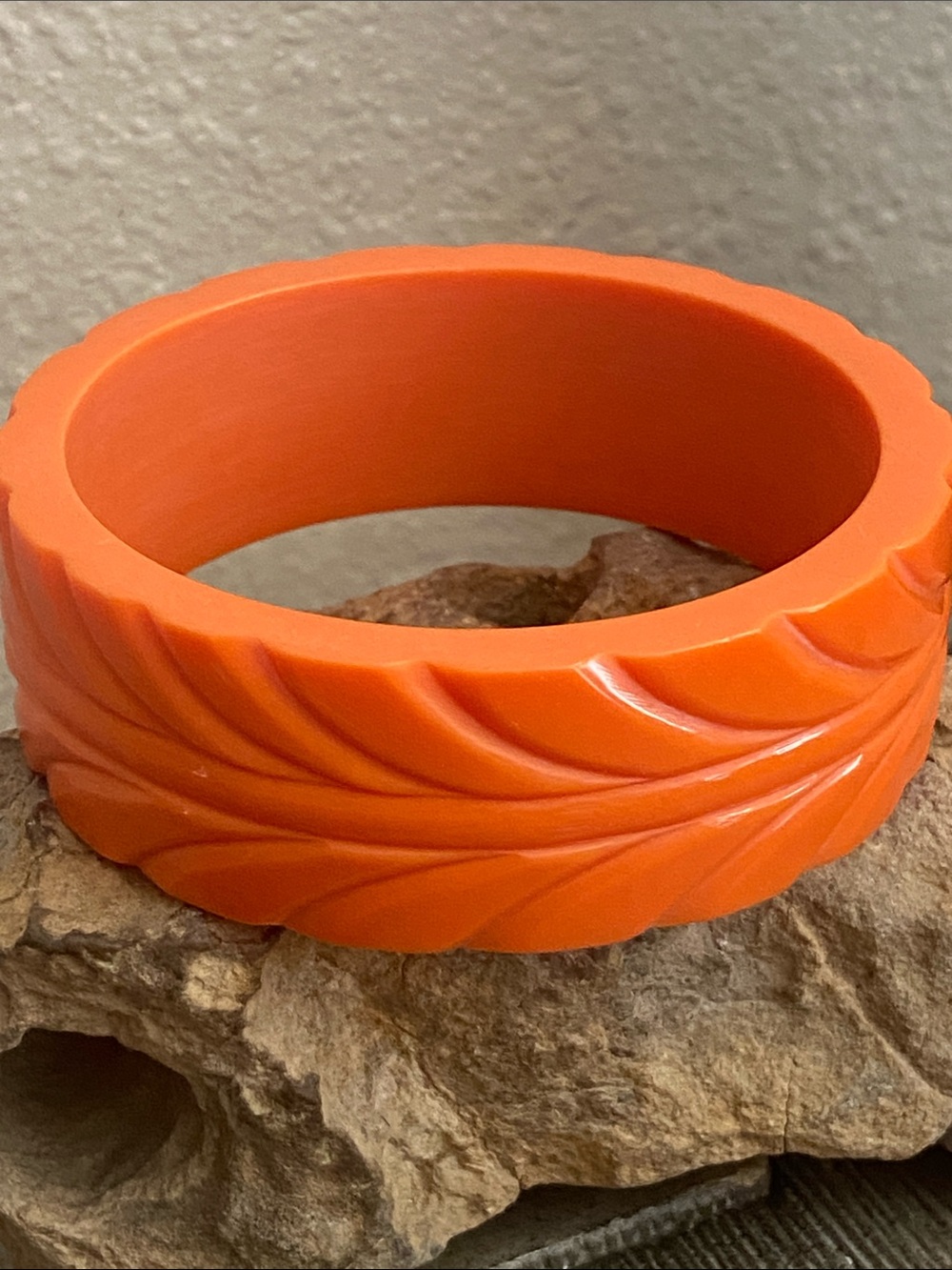 Vintage 80s Carved Orange Lucite Bangle Bracelet